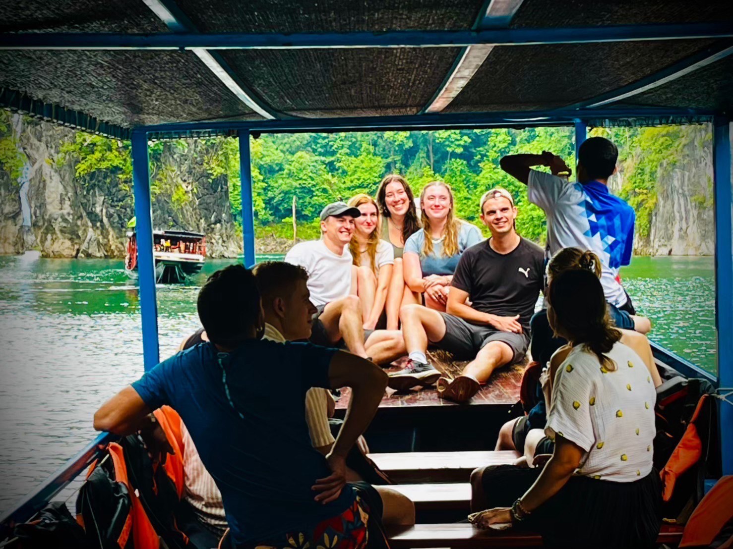 Tourists enjoying the Chieow Lan lake tour on a long tail boat.