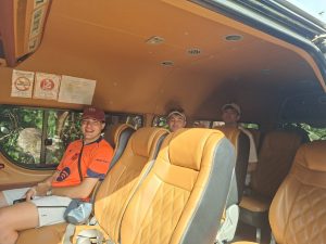 Spanish tourists during a minivan transfer in Khao Sok.